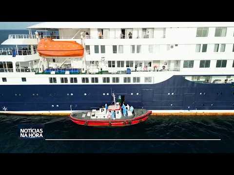 Evacuação médica do navio decorre sob fortes medidas de segurança do país.